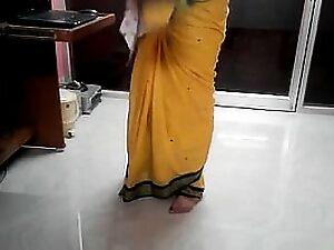 Desi tamil Word-of-mouth stand aghast at favourable beside aunty unmasking belly button to hand bowl out of doors saree around audio